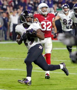 Ravens running back Justin Forsett rushed for his second touchdown of the season against the Cardinals (AP/Photo Ross D. Franklin)