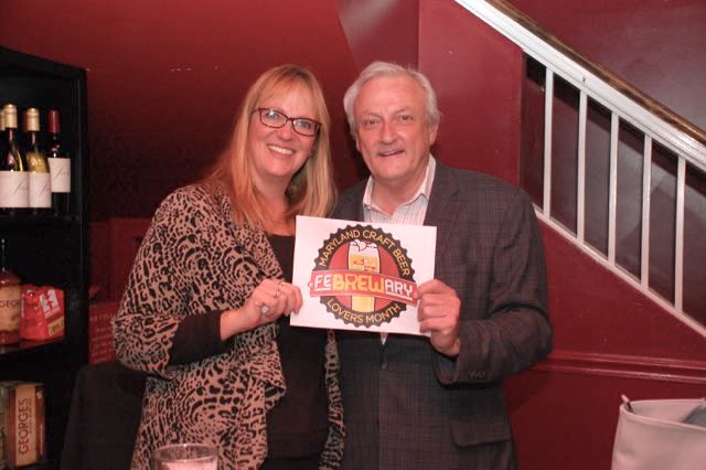 Ann McGinnis Hillyer of Shore Craft Beer and Sen. Jim Mathias show off the logo the State of Maryland will use to promote Febrewary: Maryland Craft Beer Lovers Month. (Courtesy: Shore Craft Beer)