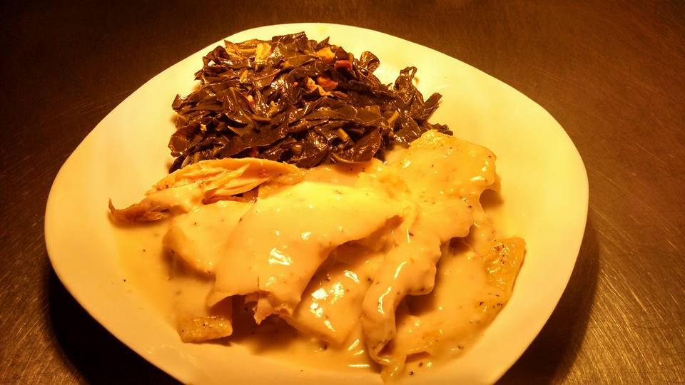 This is one of Crush-N-Crab's regular menu items---Homemade Chicken and Dumplings with a side of Collard Greens Courtesy: Crush-N-Crab