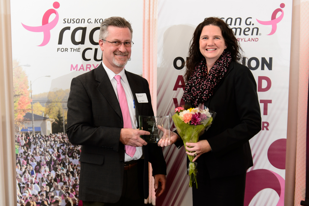 Tisho Jessop at the 2016 Power of a Promise: Annual Appreciation Reception accepting the Maryland Affiliate Award. (Courtesy: Komenmdblog.org)