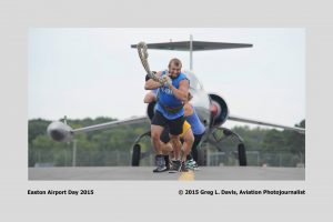 Teams of 6 pull a jet at last year's Easton Airport Day. (Photocredit: